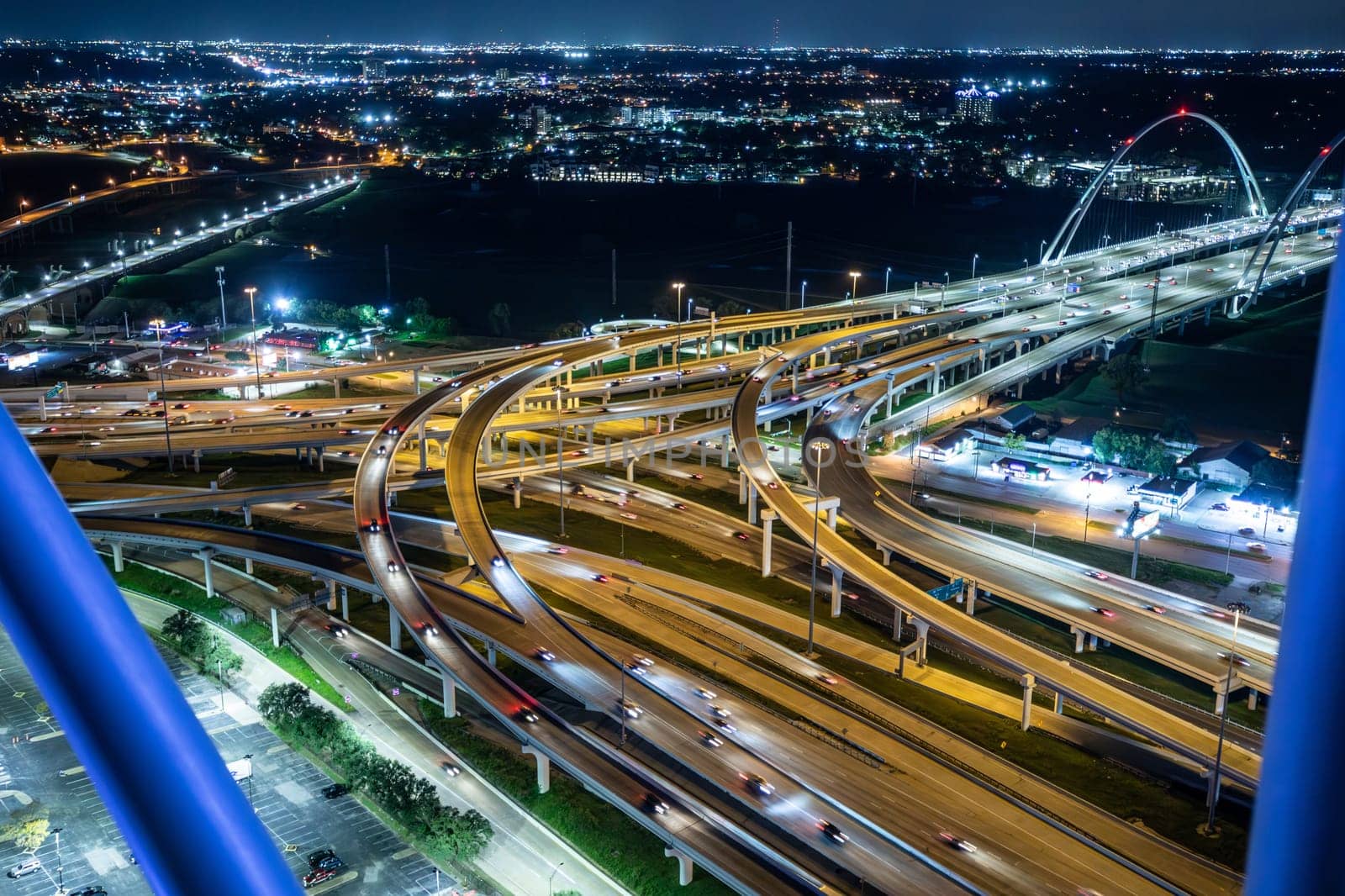 scenic skyline of Dallas by night with view to the highways and bridges, Texas, USA