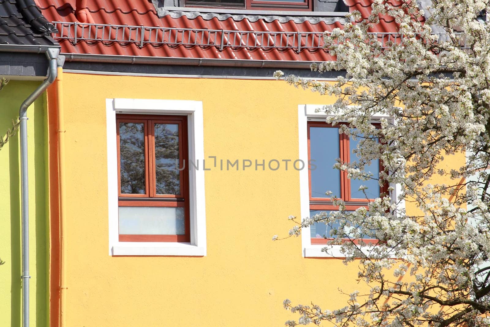 Orange residential building in spring, Bremen, Germany