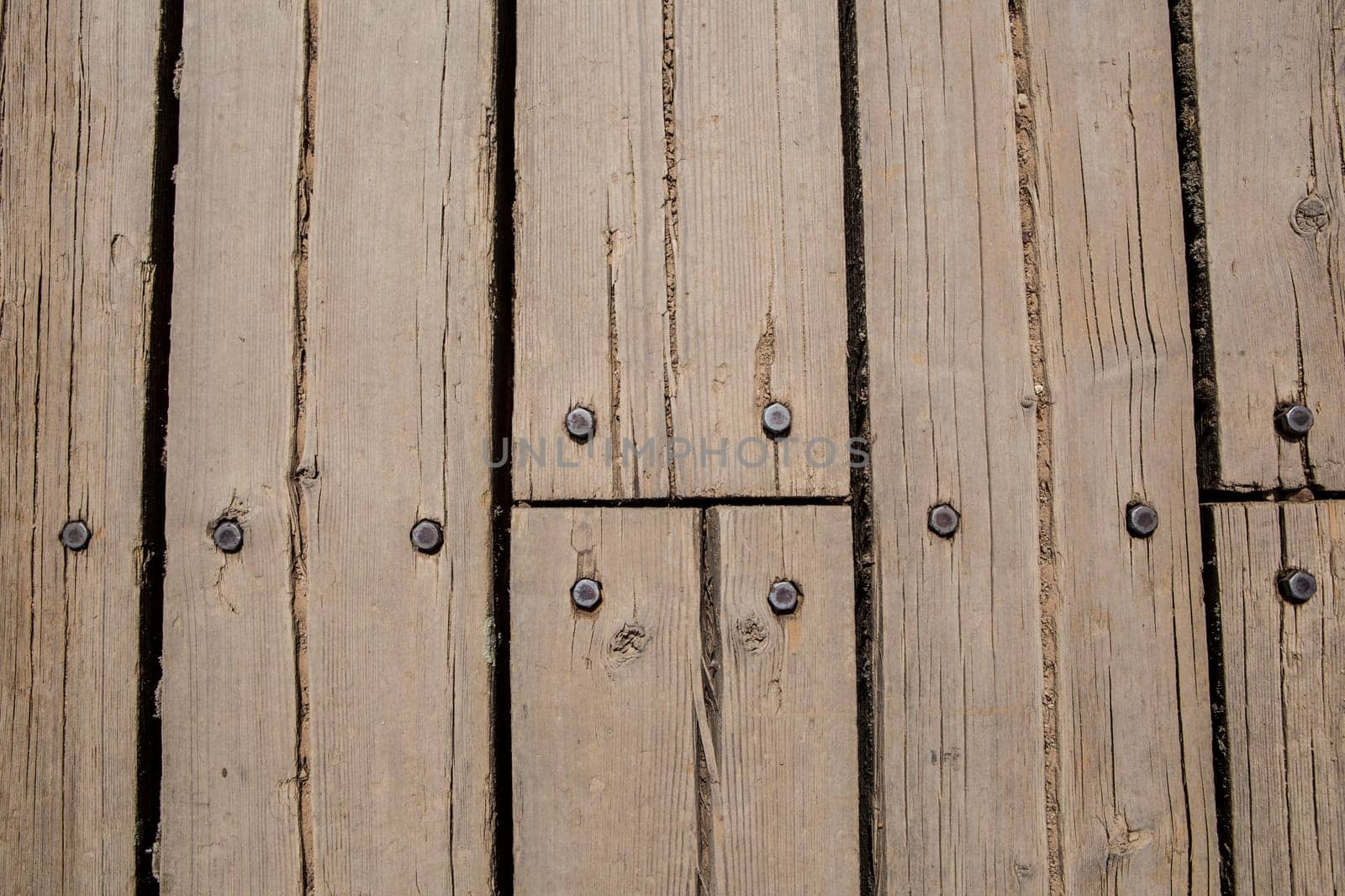 Flooring made of wooden planks for a pedestrian walkway on a hiking trail. Overhead view