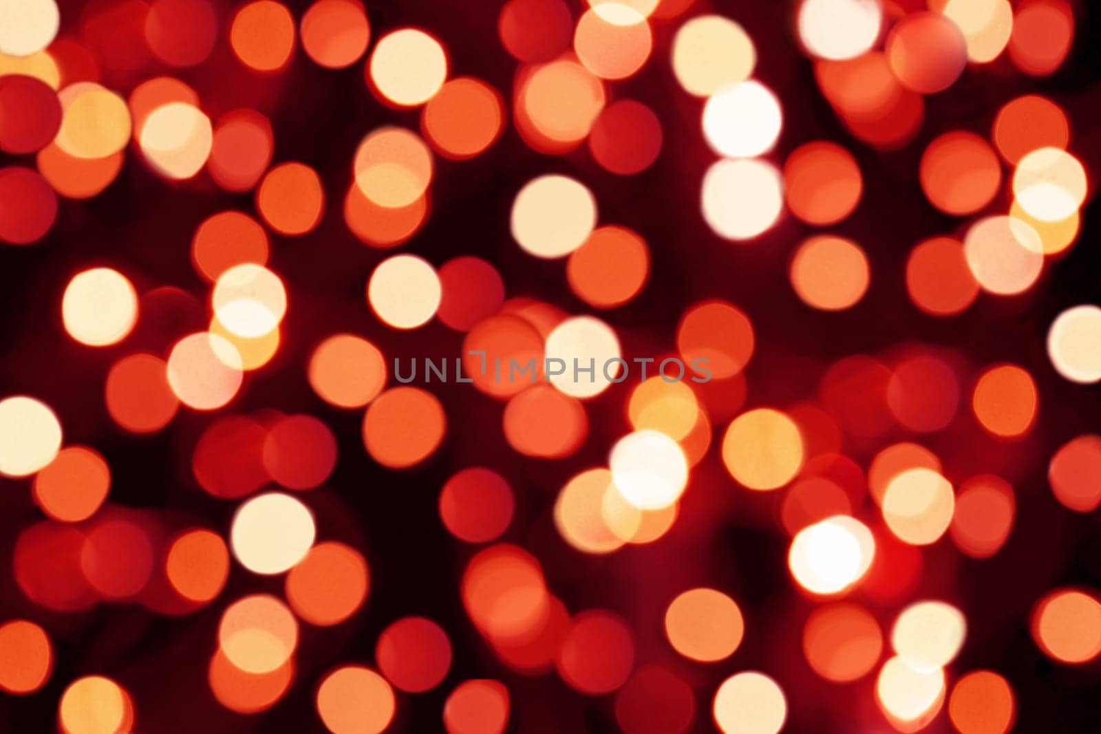 Red and gold background with dots of light