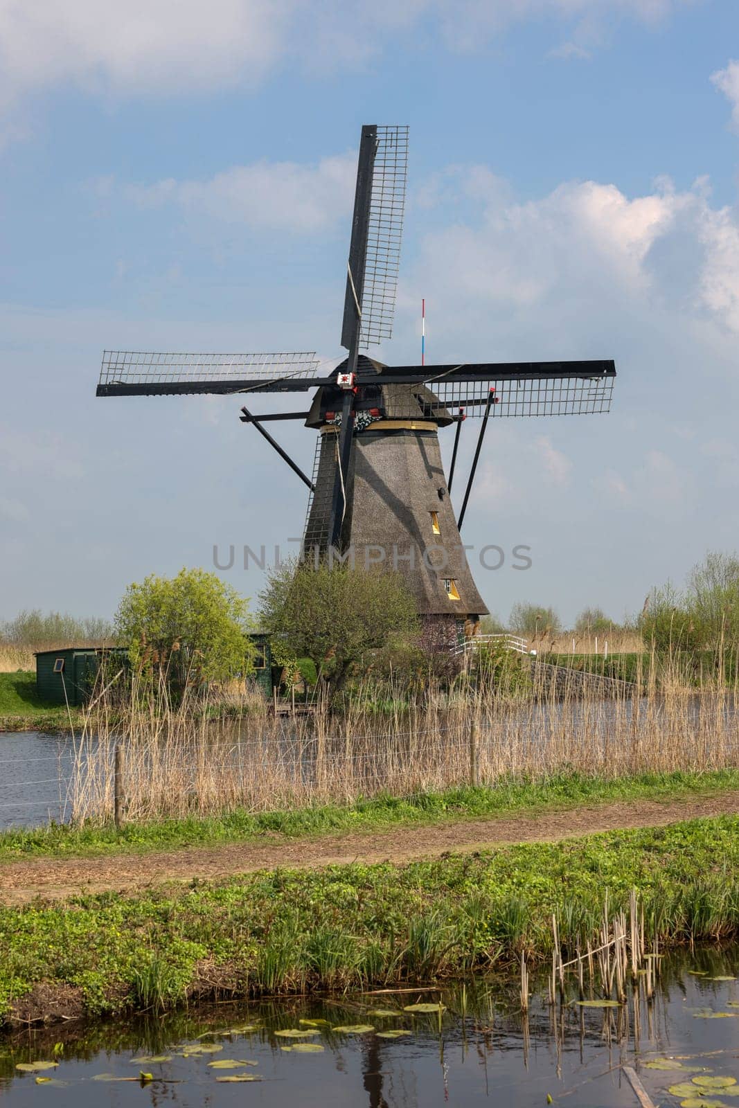 One of the 19 windmills at Kinderdijk in the Netherlands. Built about 1740, this is the largest concentration of windmills in the Netherlands, a UNESCO world heritage site.