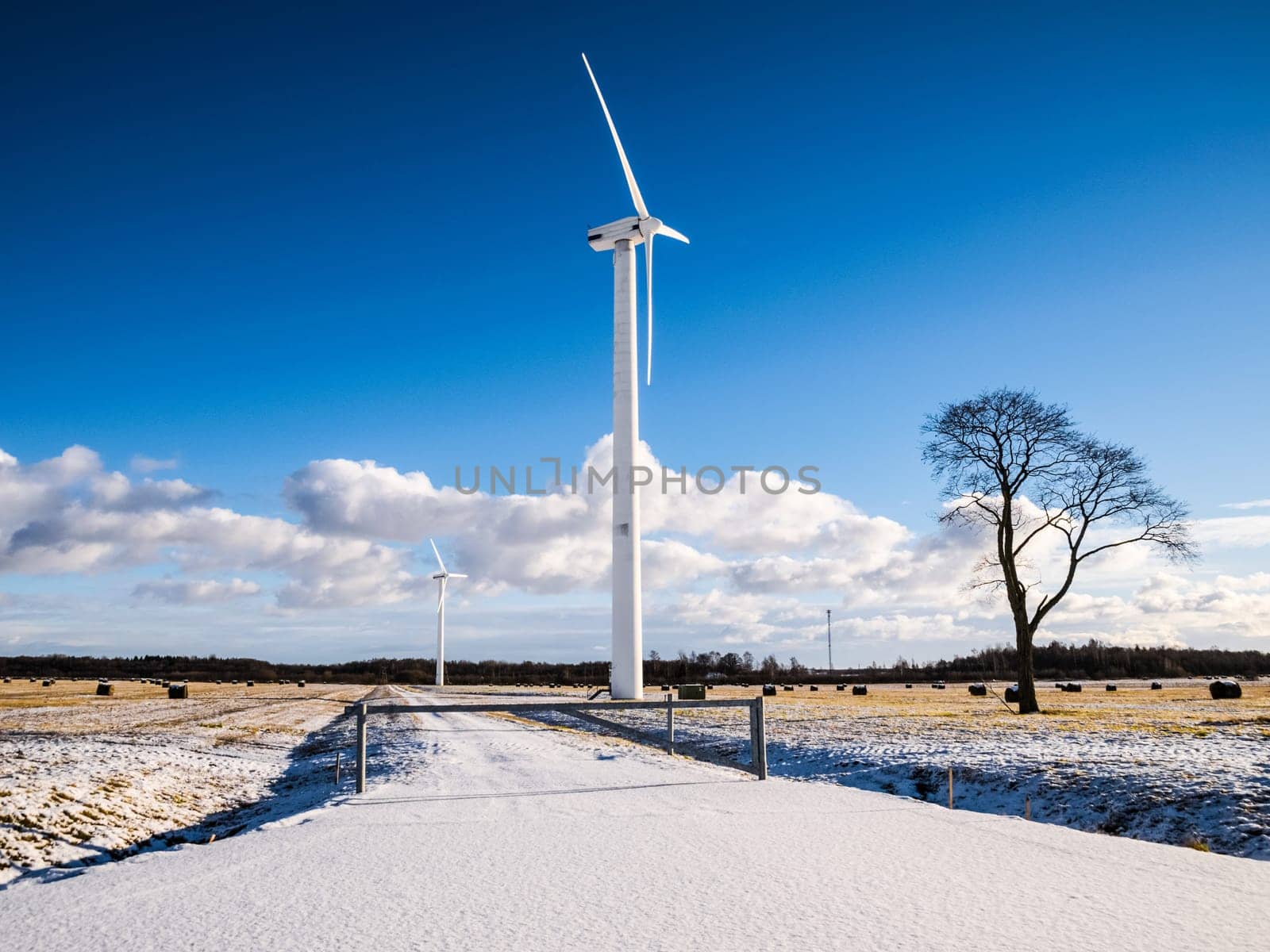 Wind turbine for the extraction of electricity from the wind. Two wind turbines.