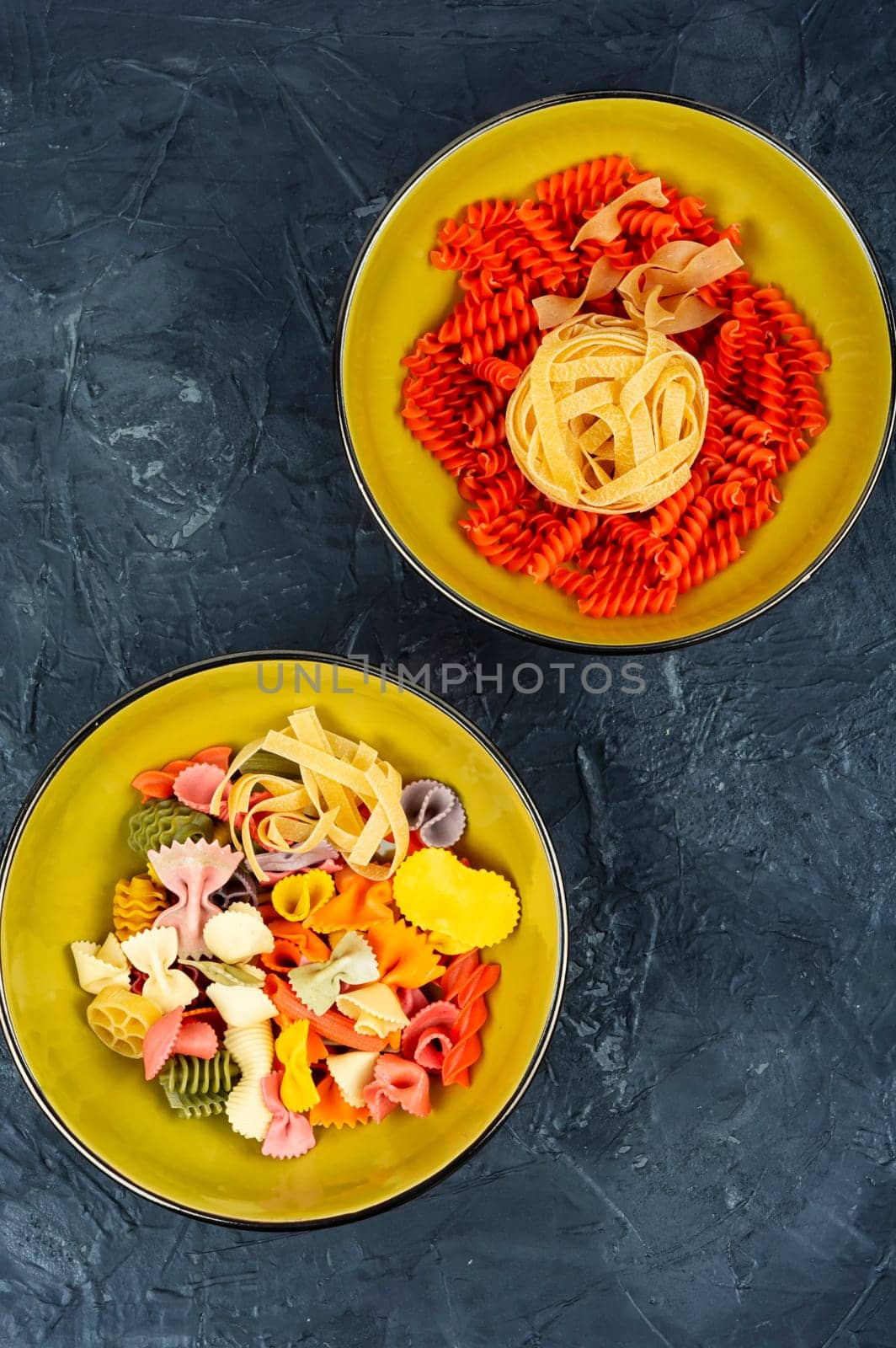 Various kinds of uncooked pasta, noodles and spaghetti. Macro.