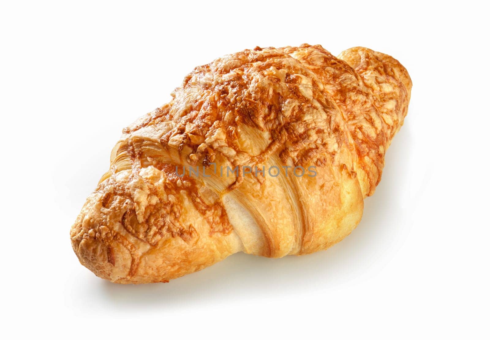 A golden brown croissant on white with a generous layer of melted cheese, creating a symphony of flavors and textures. The golden, flaky crust and savory filling create a tempting culinary delight in this image, capturing the essence of a delicious bakery treat.