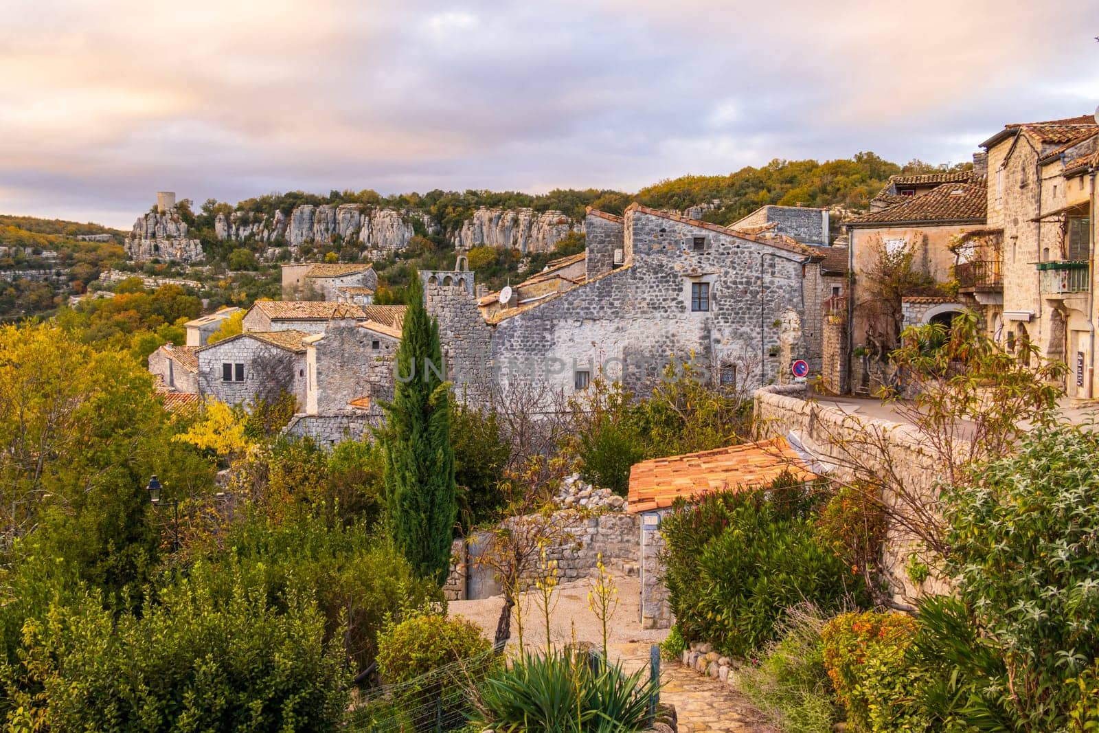 View over the roofs of the village of Balazuc, recognized historical heritage and member of the association Les Plus Beaux Villages de France. Vertical photography taken in France
