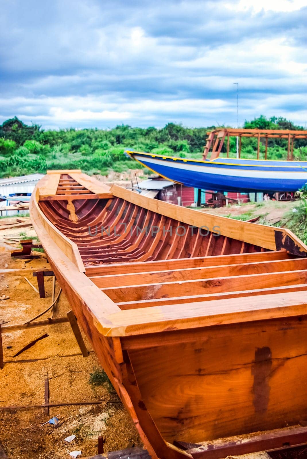 Construction of a new fishing wooden boat in Thailand. Wooden boat