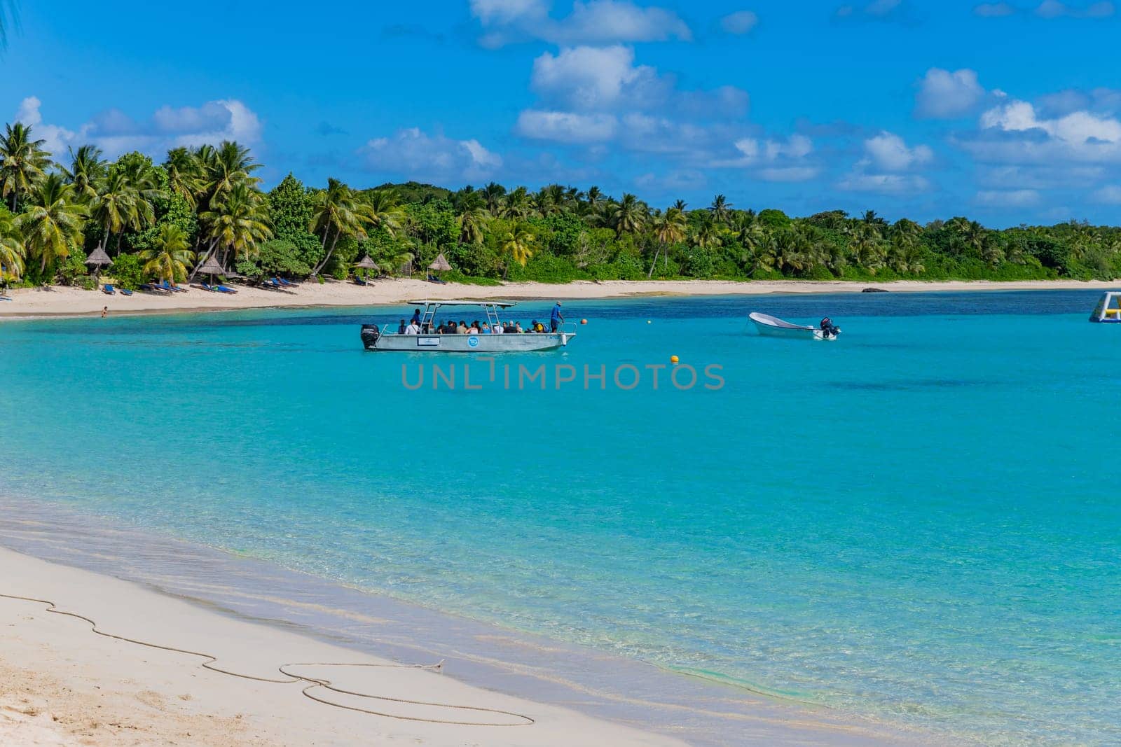 Nacula, Fiji: 26 May 2023: Tourist boats at the tropical sandy beach of Nacula island, Yasawa islands, Fiji, South Pacific Islands, Pacific