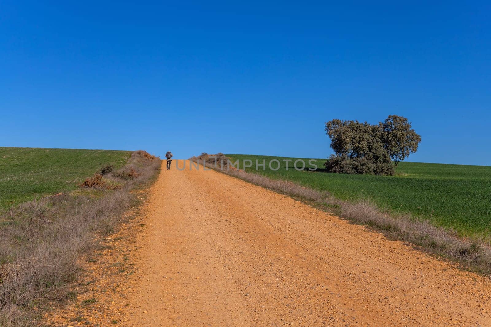 Extremadura, Spain, 04 December, 2022: Pilgrim walk along the Camino De Santiago, the Way of St. James pilgrimage route, Extremadura, Spain.