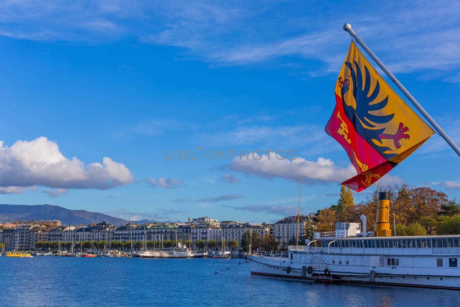 Geneva, Switzerland: November,15 2023: Boats on Lake Geneva. Lake Geneva iis a lake on the north side of the Alps, shared between Switzerland and France.