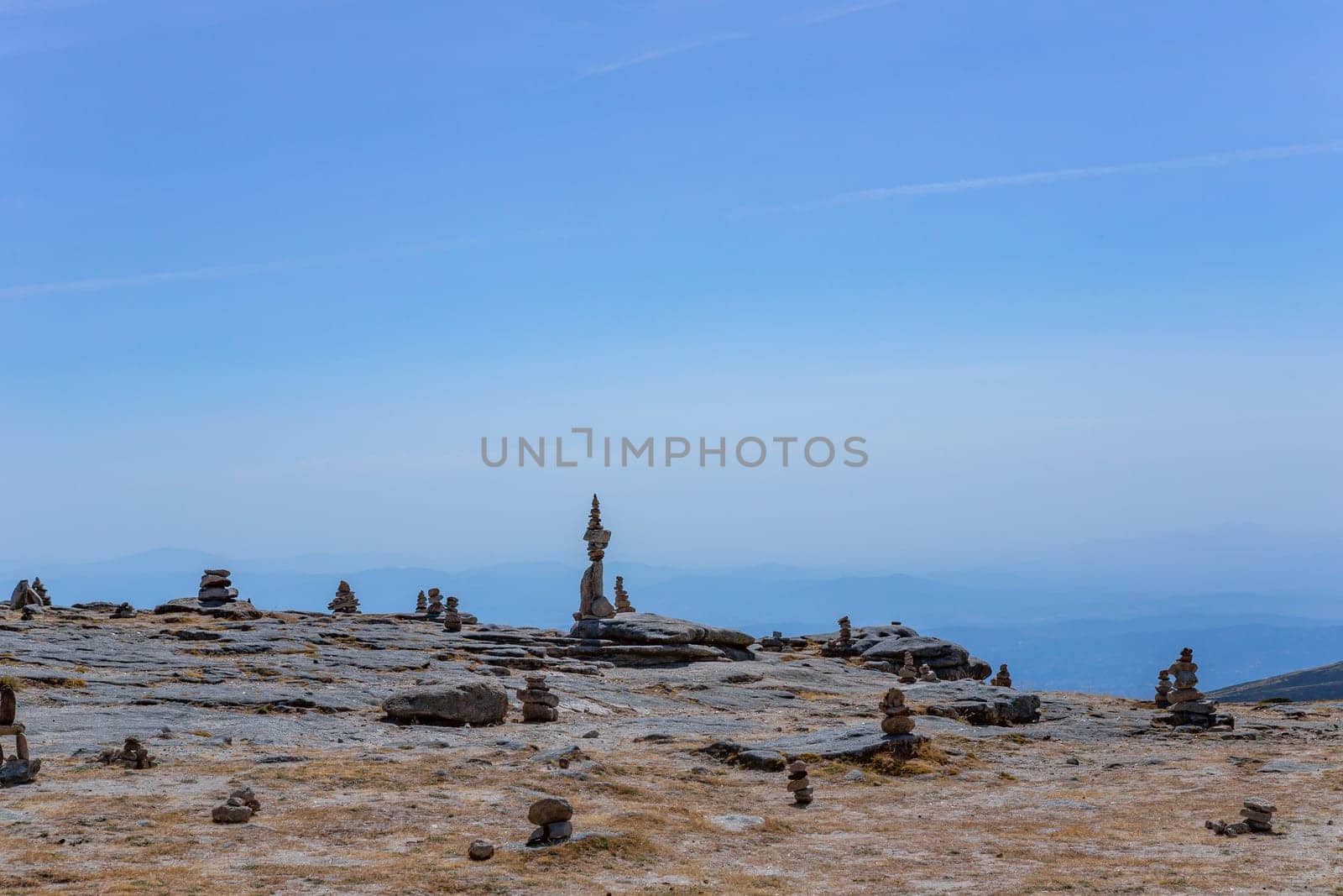 Rocky and mountainous landscape with cairns at the highest point in Portugal in Serra da Estrela Natural Park