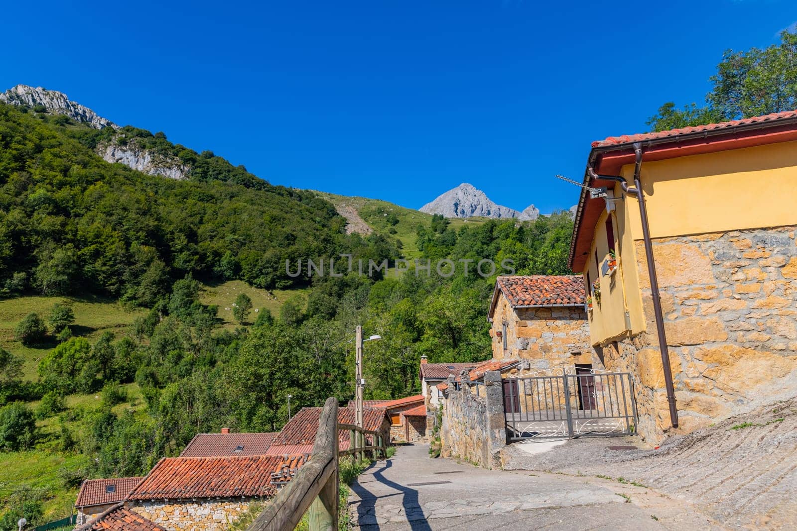 The village of Tuiza is located in the Natural Park of Las Ubinas-La Mesa. Behind it stands the imposing Pena Ubina with its 2417 m high. Asturias, Spain.