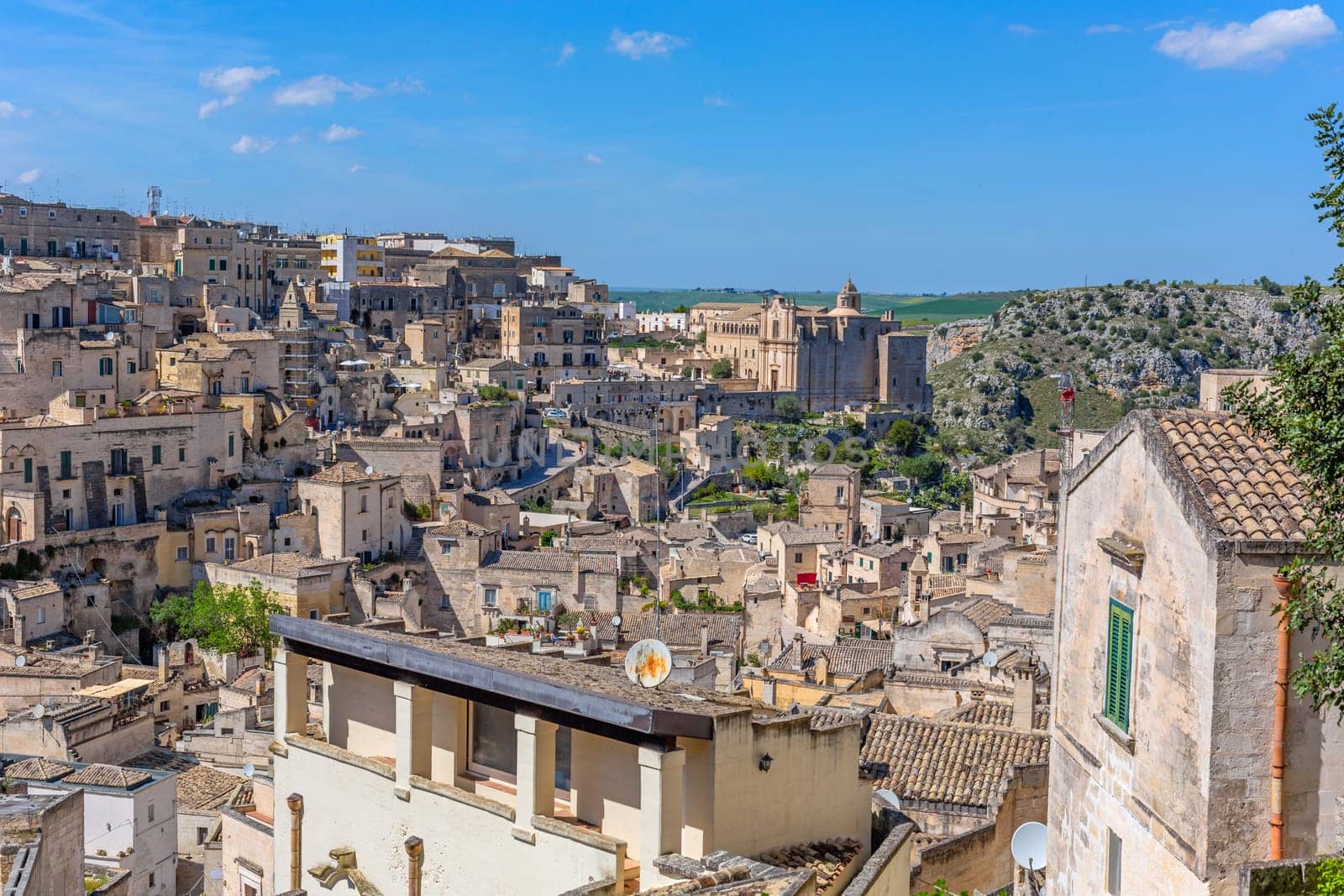 Matera, Italy - 6 May 2023: Old town of Matera (Sassi di Matera), Basilicata, southern Italy. Prehistoric cave dwellings