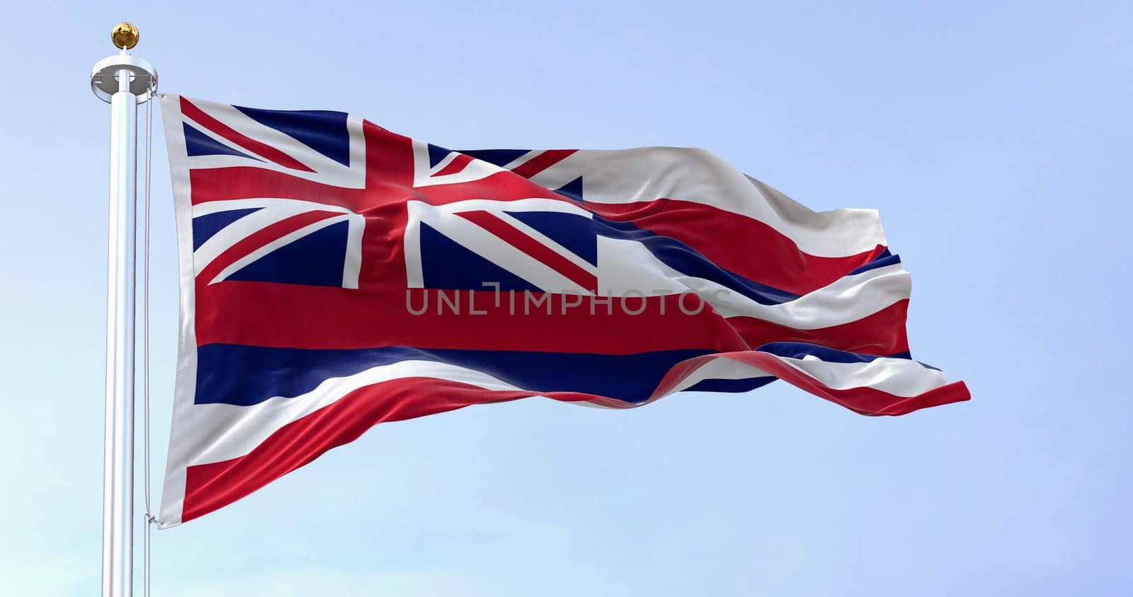 The flag of Hawaii waving in the wind on a clear day. Eight horizontal stripes white, red, blue, Union Jack in canton. 3d illustration render. Selective focus. Fluttering fabric