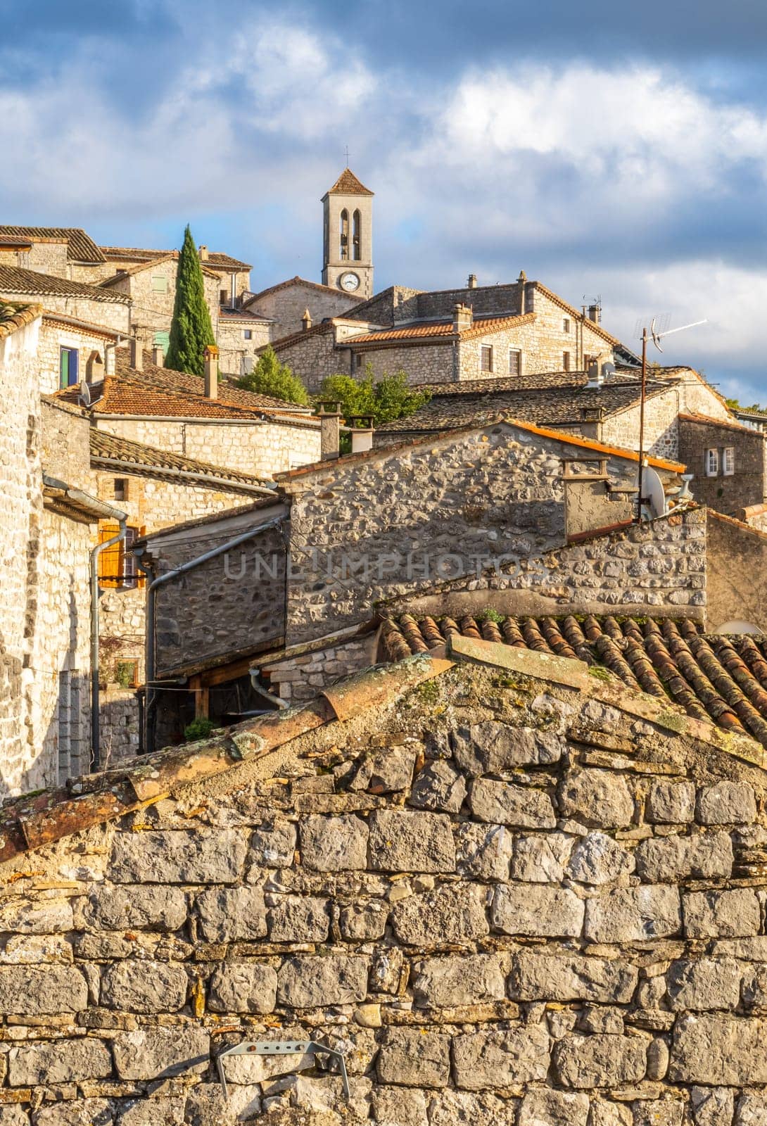 Balazuc village seen from the roofs, recognized as historical heritage and  member of The Most Beautiful Villages of France association. Vertical photography taken in France
