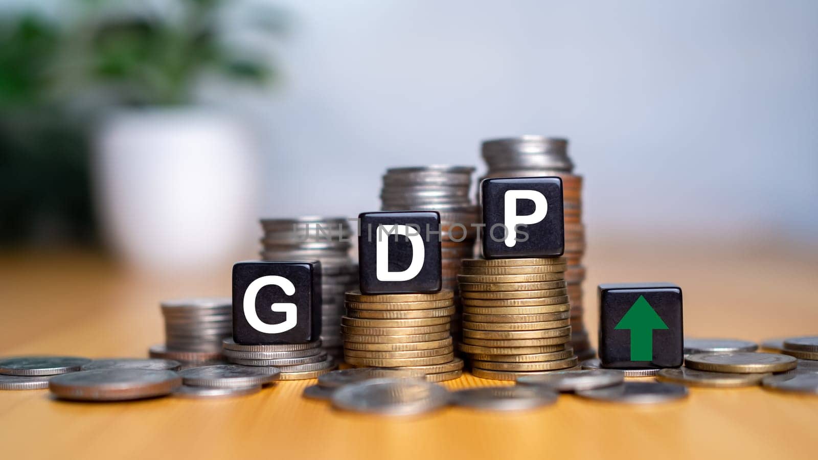 Gross domestic product, Financial, Management, Economic, Inflation, recession and Money concepts, GDP block with Coins stack and UP and Down arrow symbol icon.