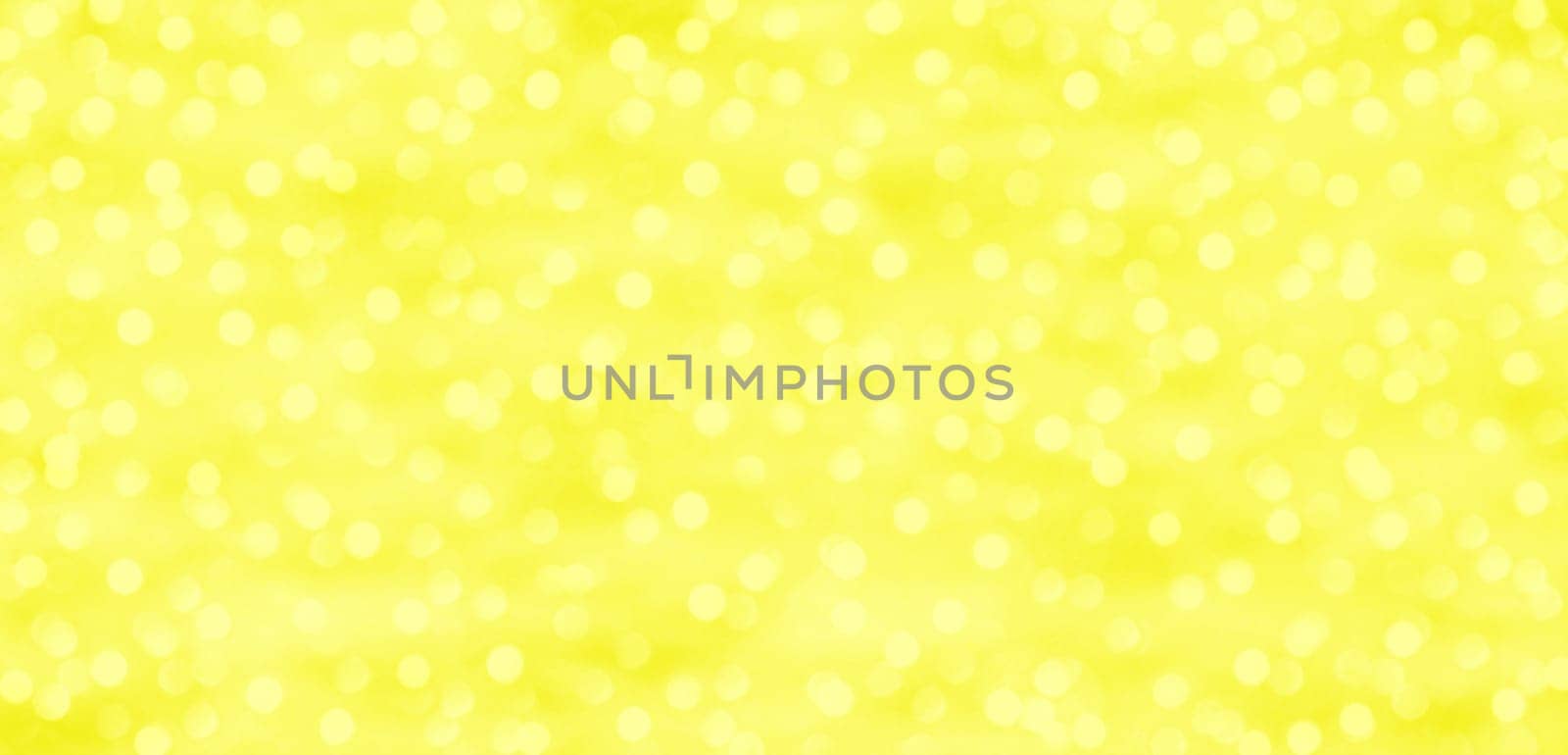 Yellow and gold background with dots of light