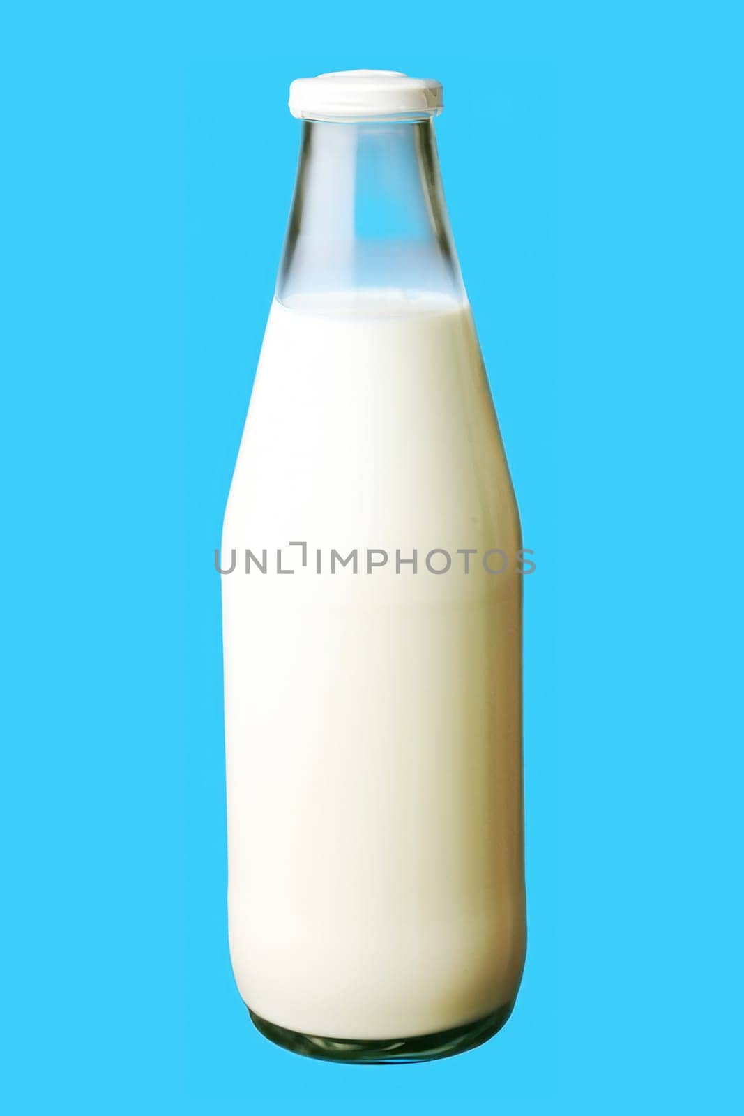 Bottle of fresh milk isolated on blue background