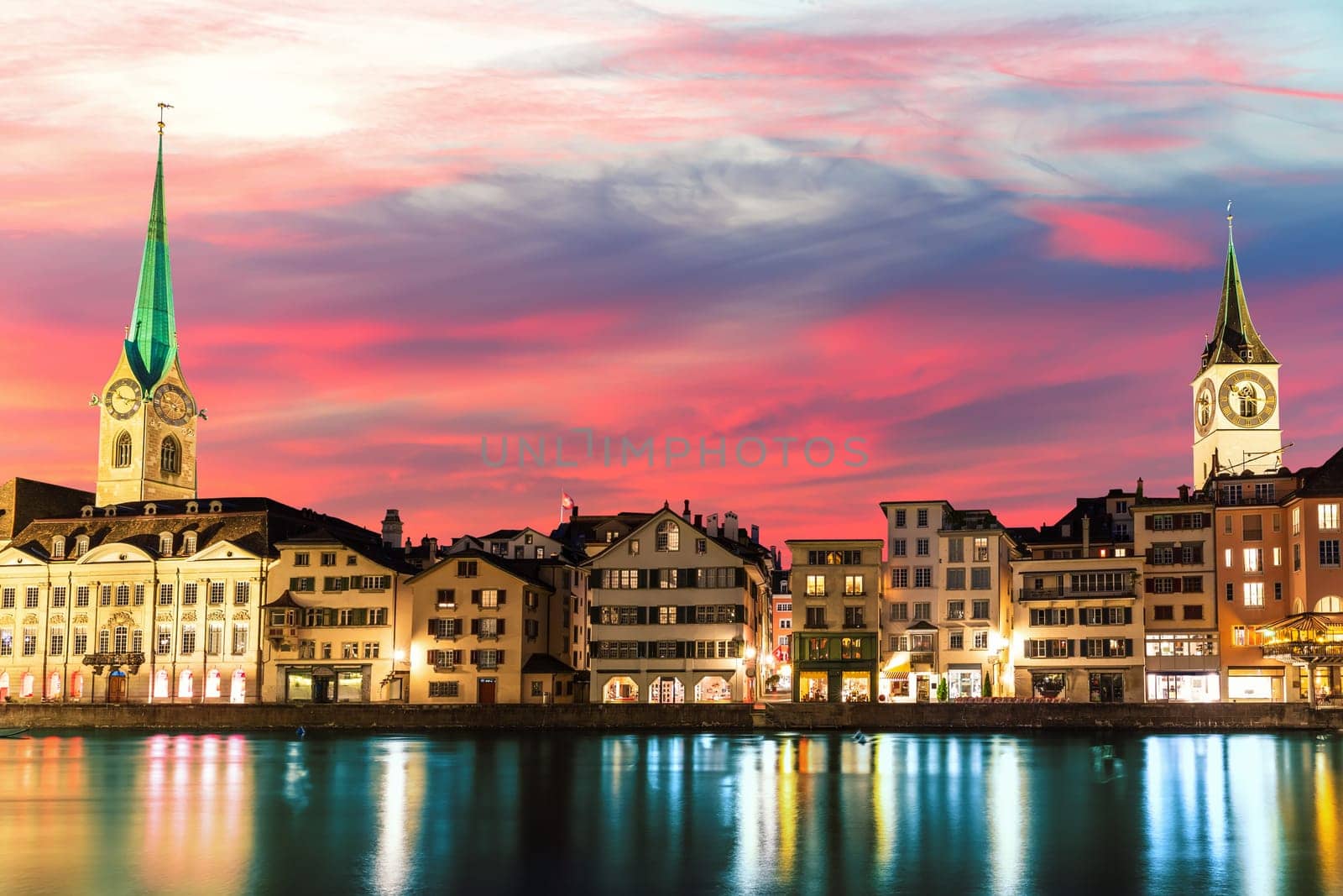 Sunset promenade near St. Peter's church and Fraumunster abbey, Zurich, Switzerland.