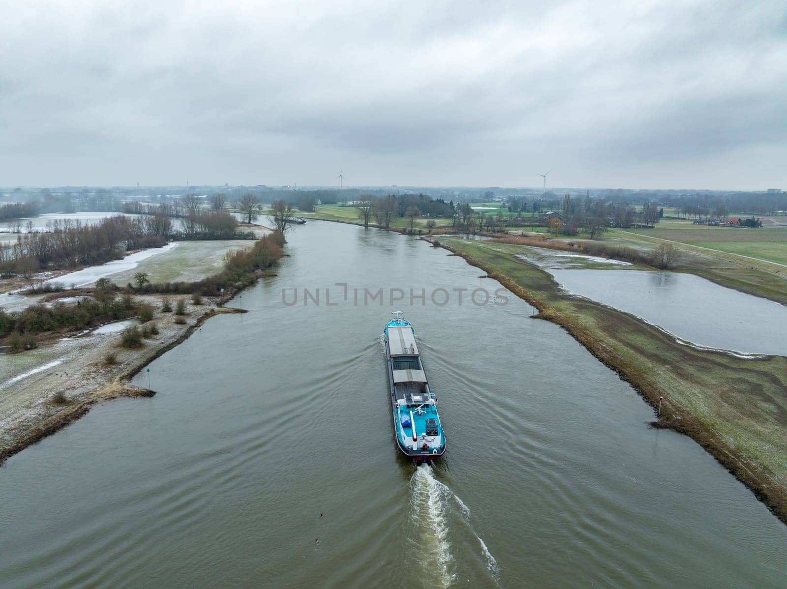 Cargo boat on the IJssel river in the Netherlands