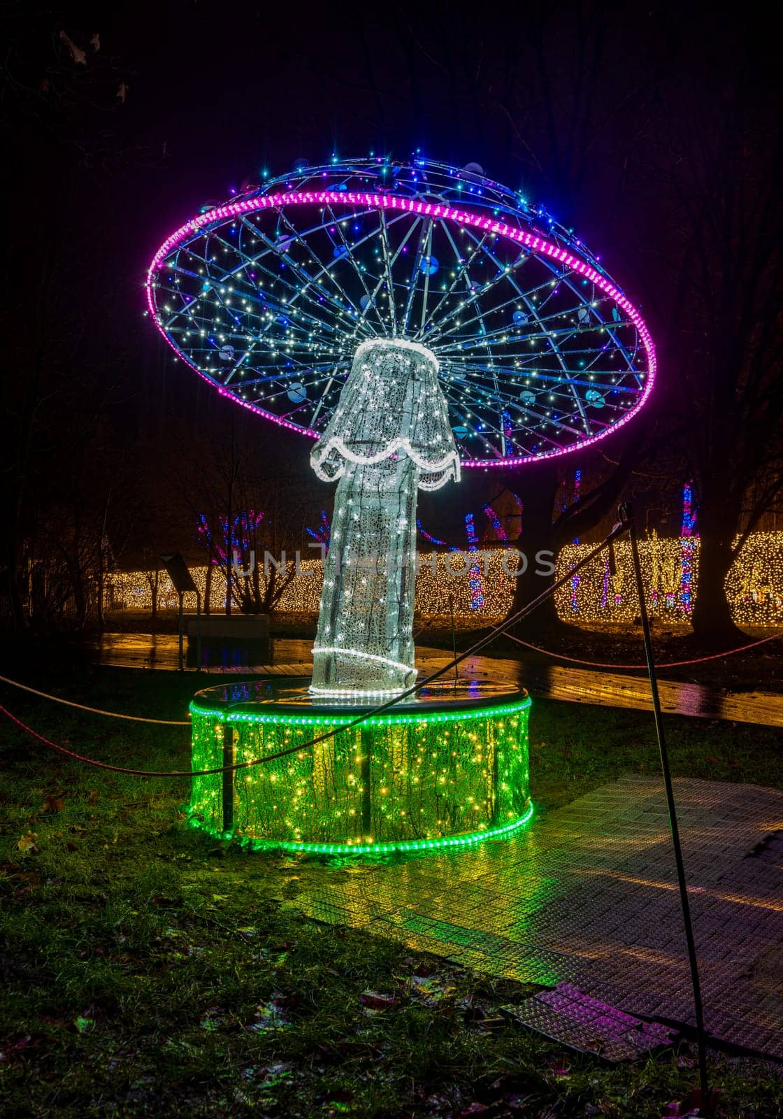 KRAKOW, POLAND - DECEMBER 25, 2023: Smurfs exhibition in the Garden of Light during Christmas time