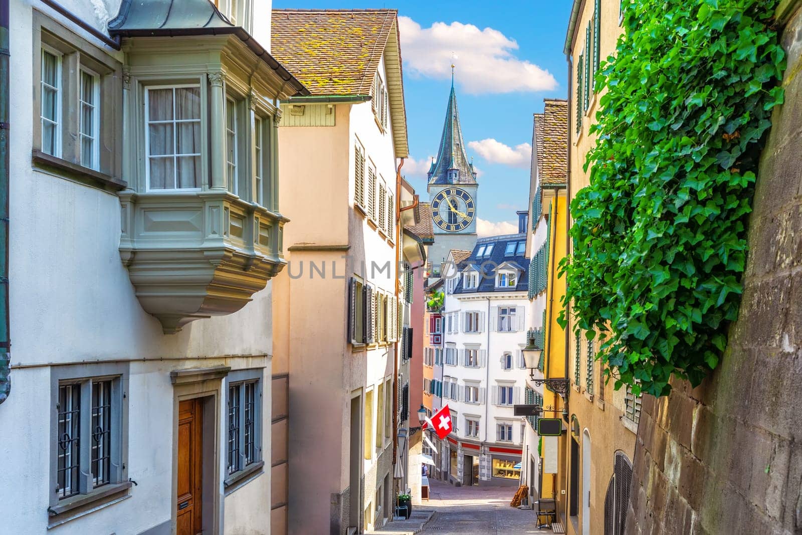 Empty european street by the Fraumunster abbey or Women's Minster in the downtown of Zurich, Switzerland.