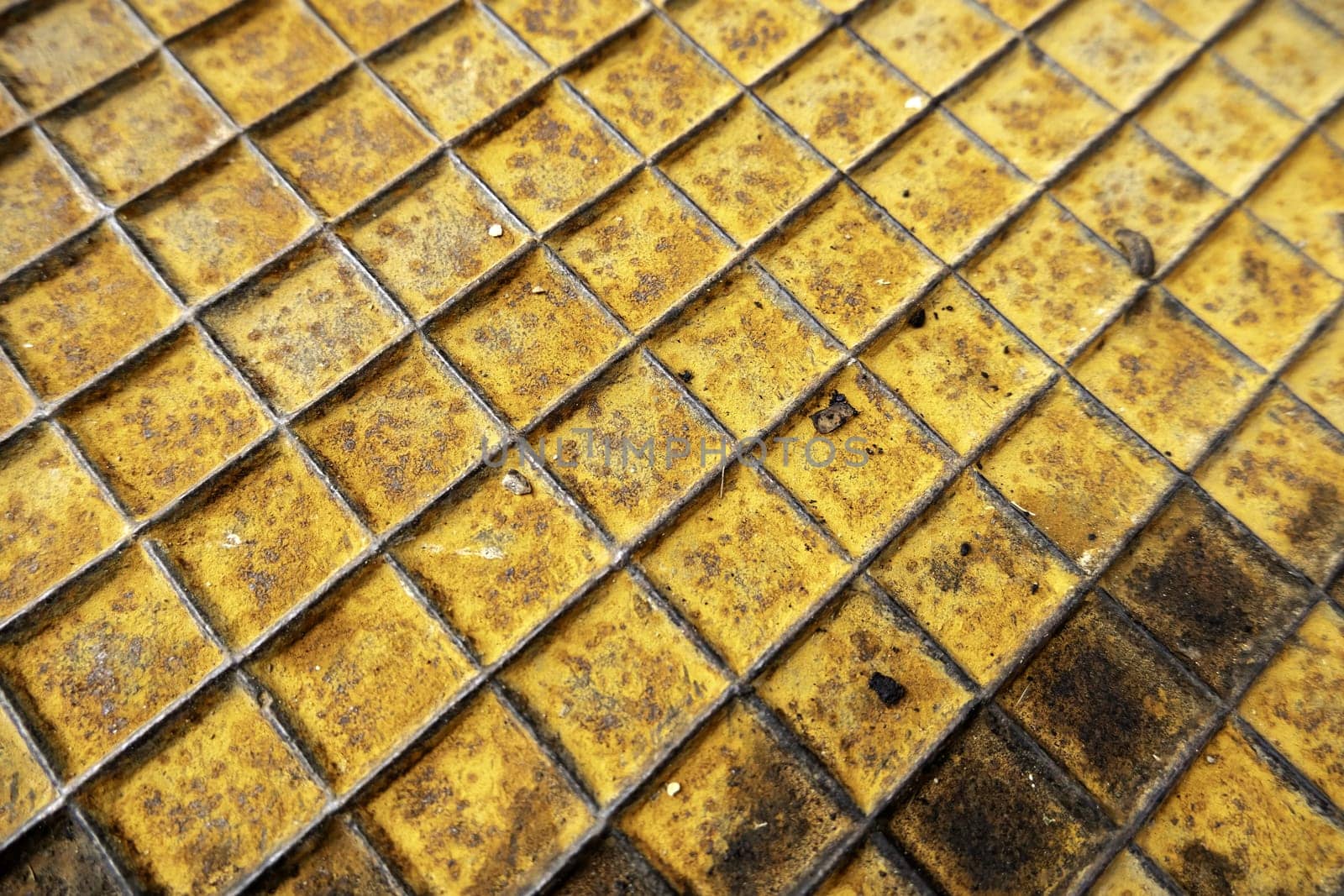 Detail of a rough and rusty metal plate due to the passage of time