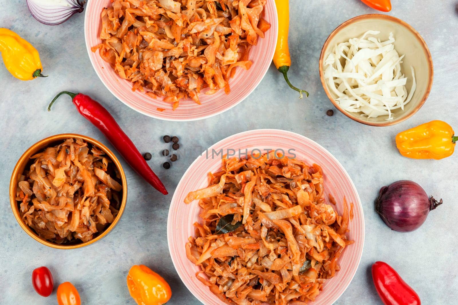 Tasty stewed cabbage in a ceramic bowl. Fried Sauerkraut. German cuisine.