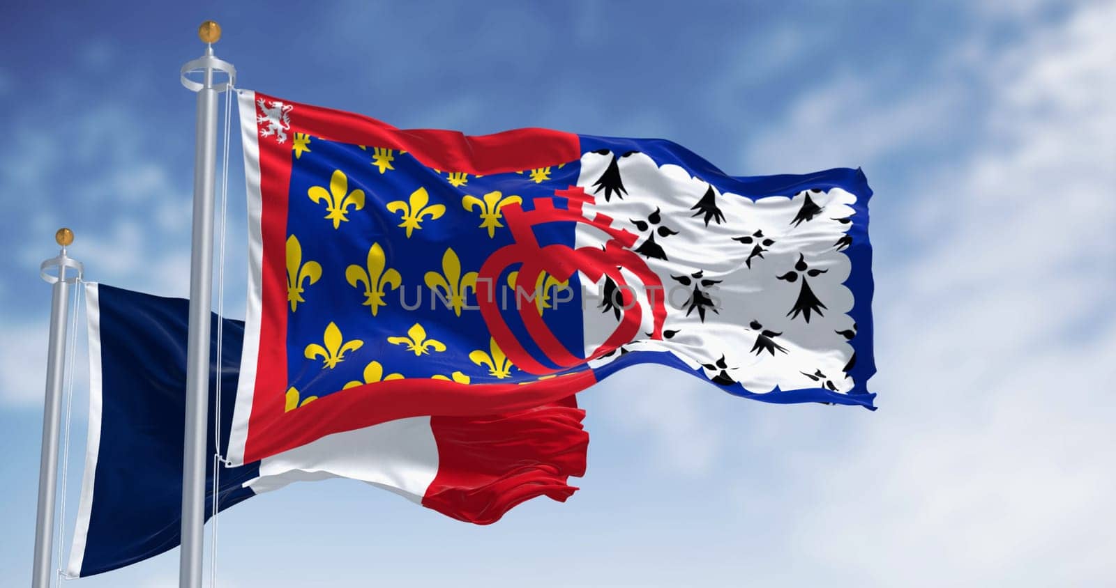 The flag of Pays de la Loire French region waving in the wind on a clear day. Pays de la Loire is one of the 18 regions of France, in the west of the mainland. French administrative region