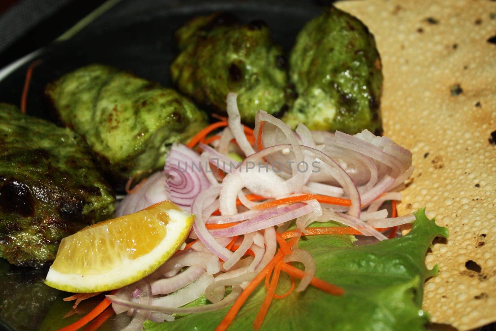 The food cooked at restaurant. Various dishes for every taste and choice.