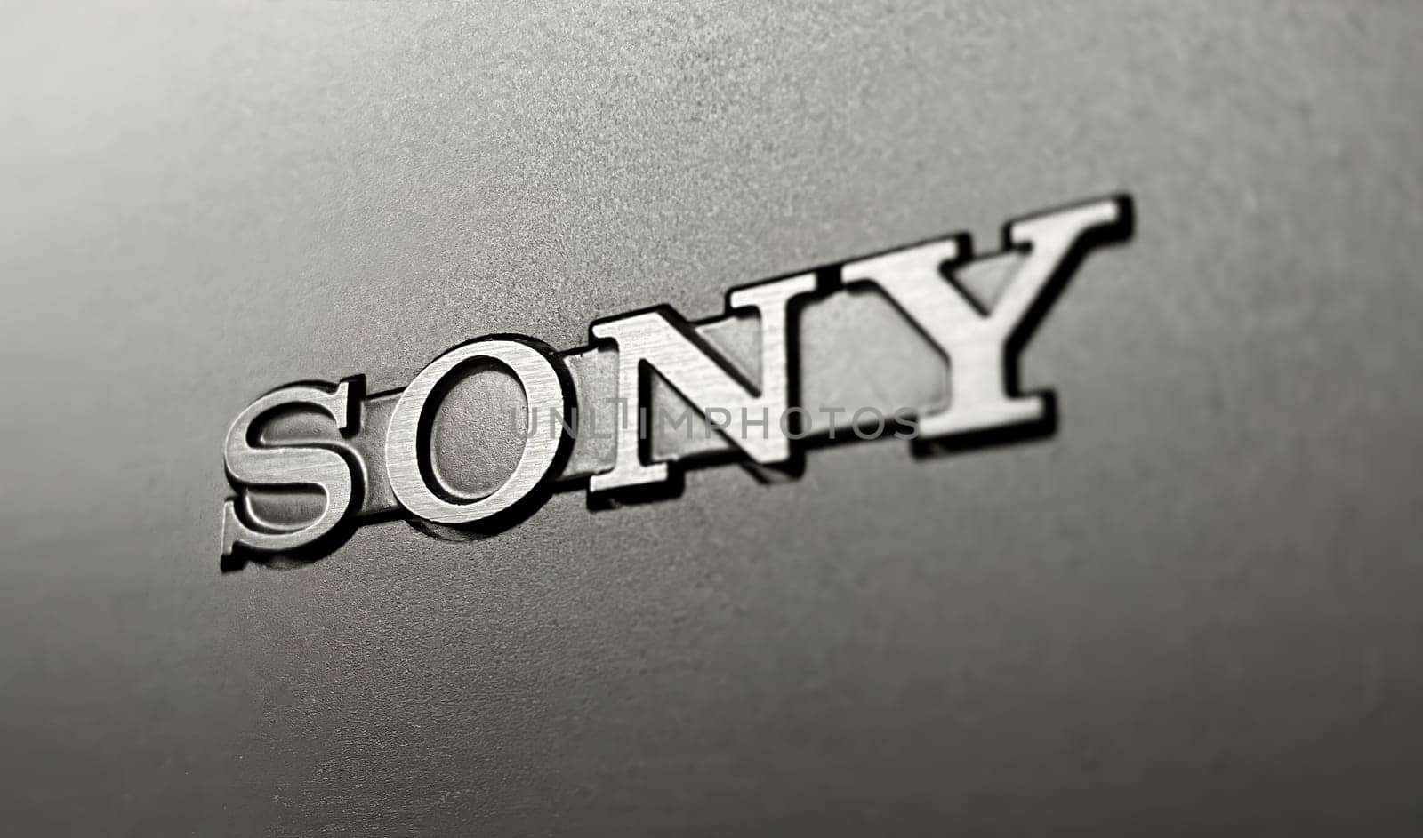 Tokyo, JP - Jan 1 2024  Close-up view of the Sony logo on a textured surface, illustrative editorial.