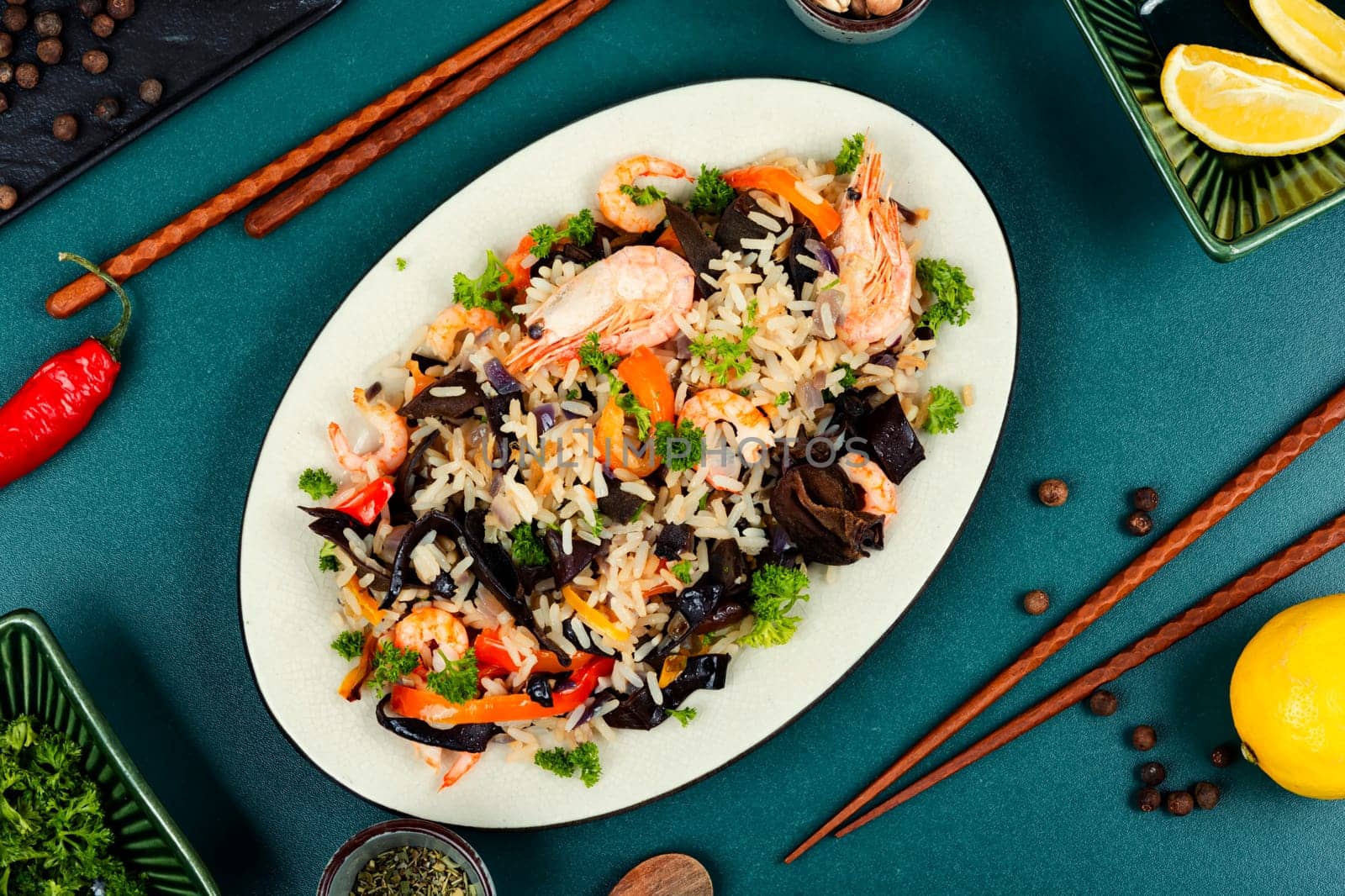 Shrimp fried rice serves on the dish. Healthy Asian meal.