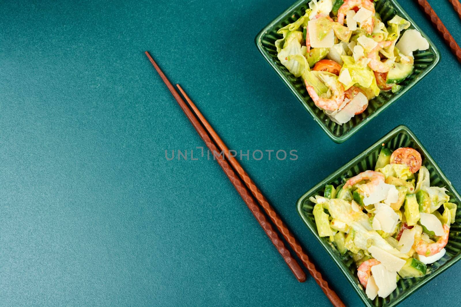 Salad with shrimp,prawns avocado and tomato in a bowl. Healthy food concept. Top view, overhead.