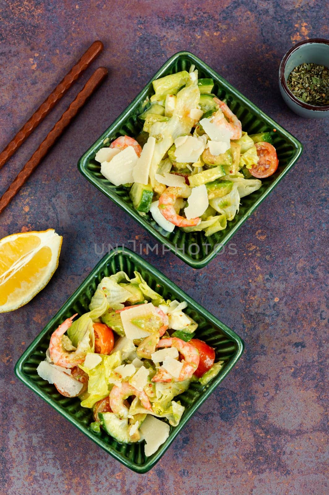 Salad with shrimp,prawns avocado and tomato in a bowl. Healthy food concept. Top view, overhead.