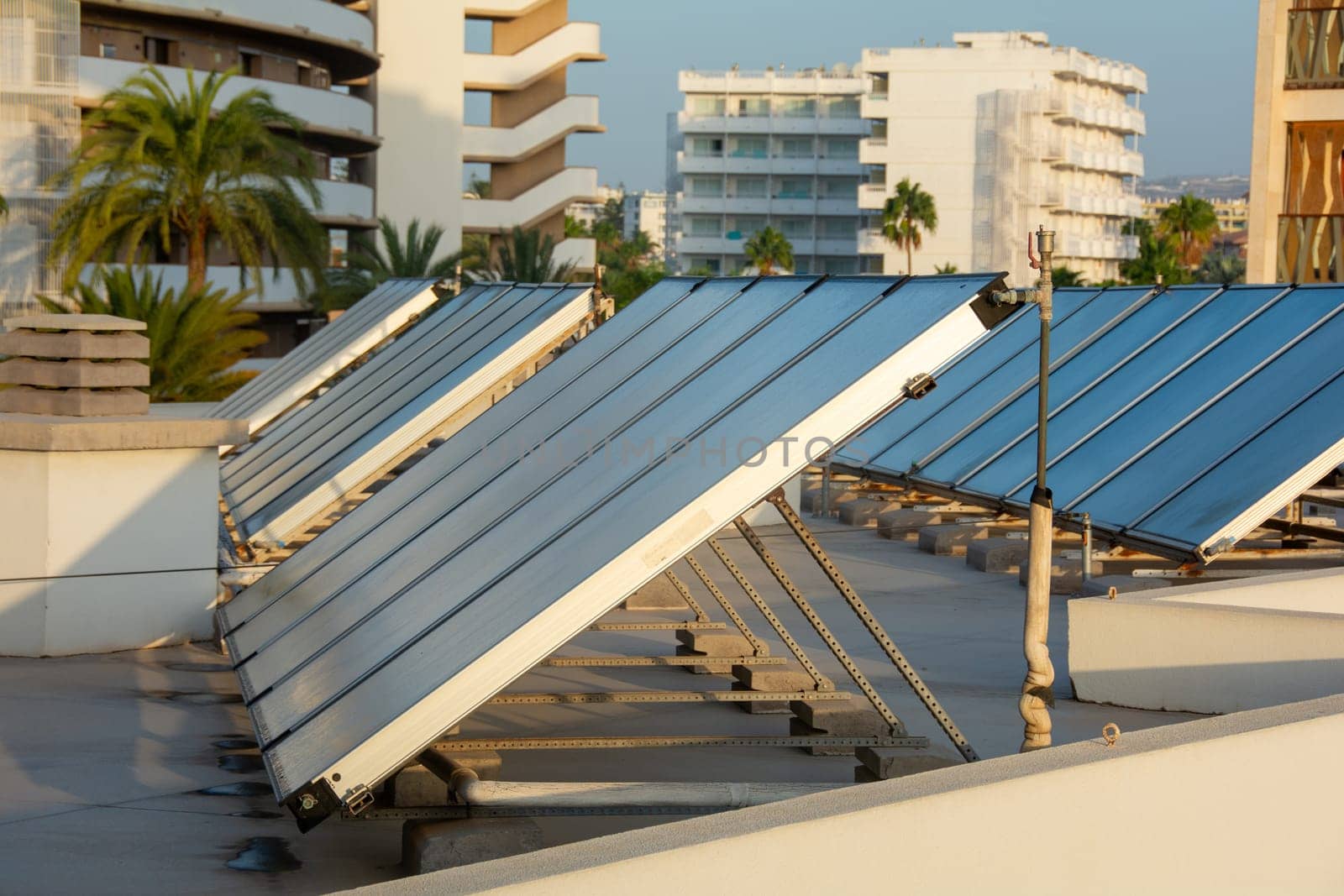 Solar panel on a Hotel roof with blue sky