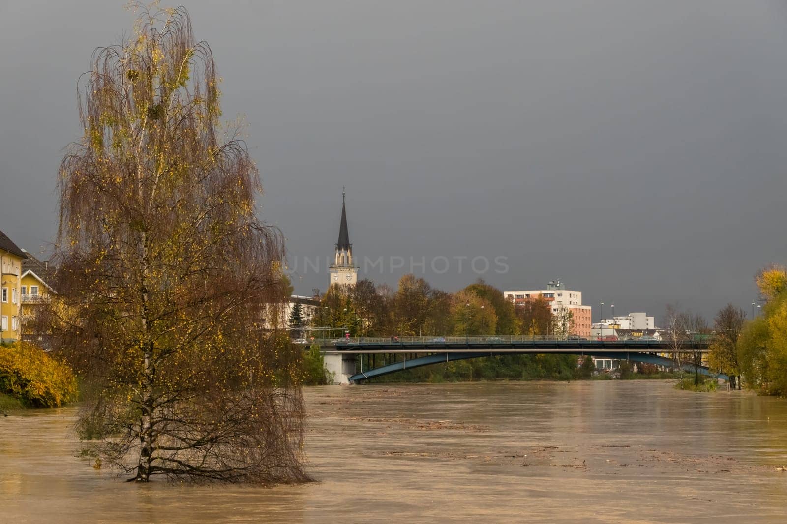 Villach, Austria - October 30th, 2018: Floodwater at rather high levels hits the town after widespread heavy rainfalls, pushing the city close to a catastrophe