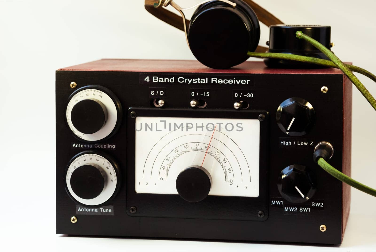 A homebrew crystal radio receiver with vintage headphones
