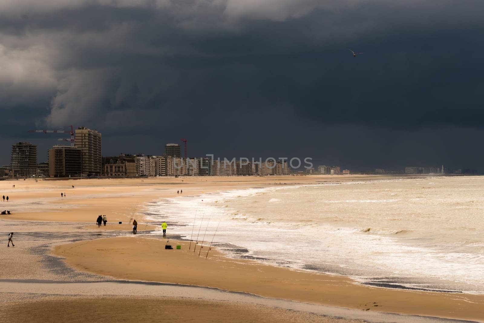 Ostend, Belgium - June 13th, 2019: A stormy days view over the beach of Ostend in Belgium at the North Sea