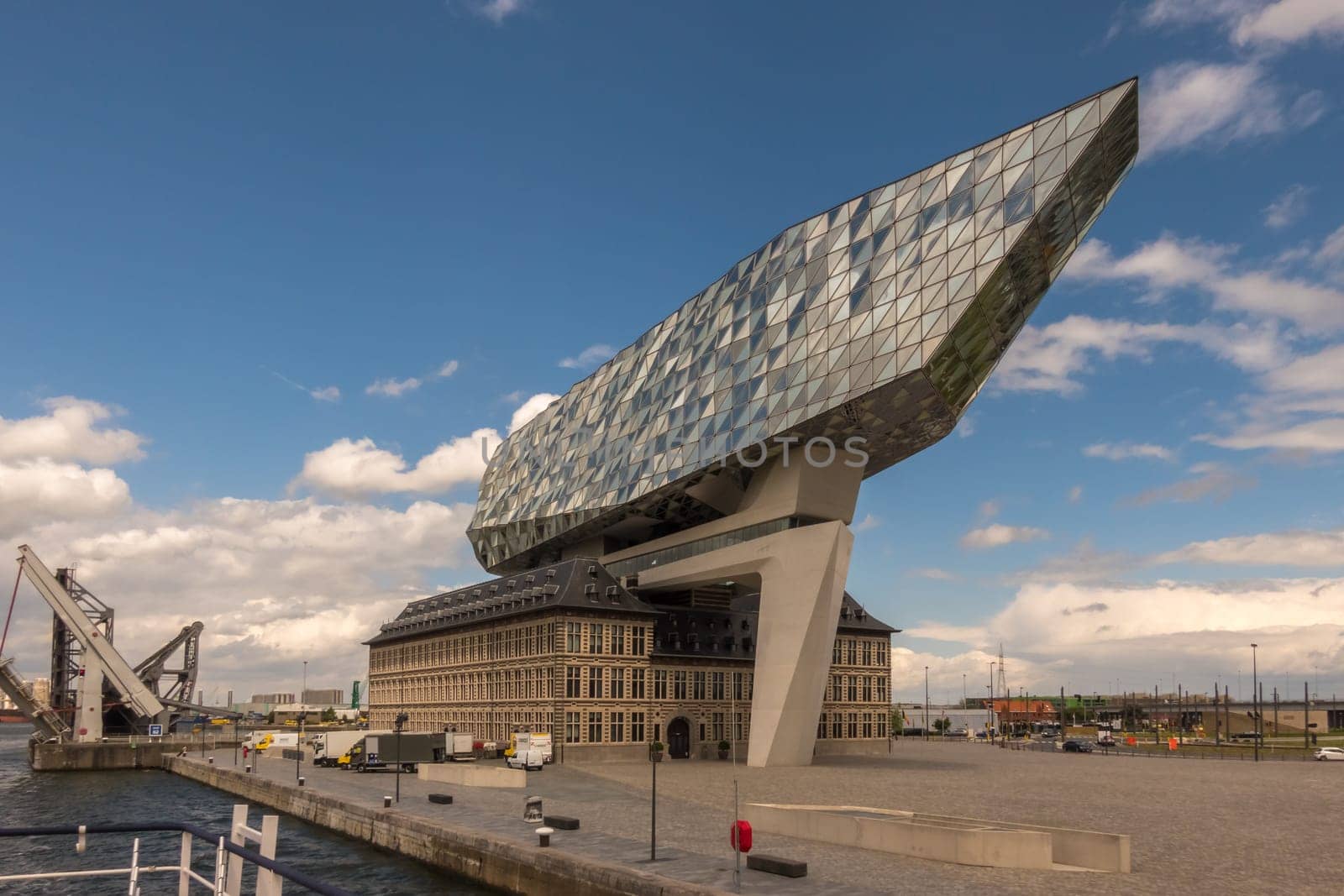 Antwerp, Belgium - June 8th, 2019: View to the unique Port House, home of the port authority's head office, at the port of Antwerp.