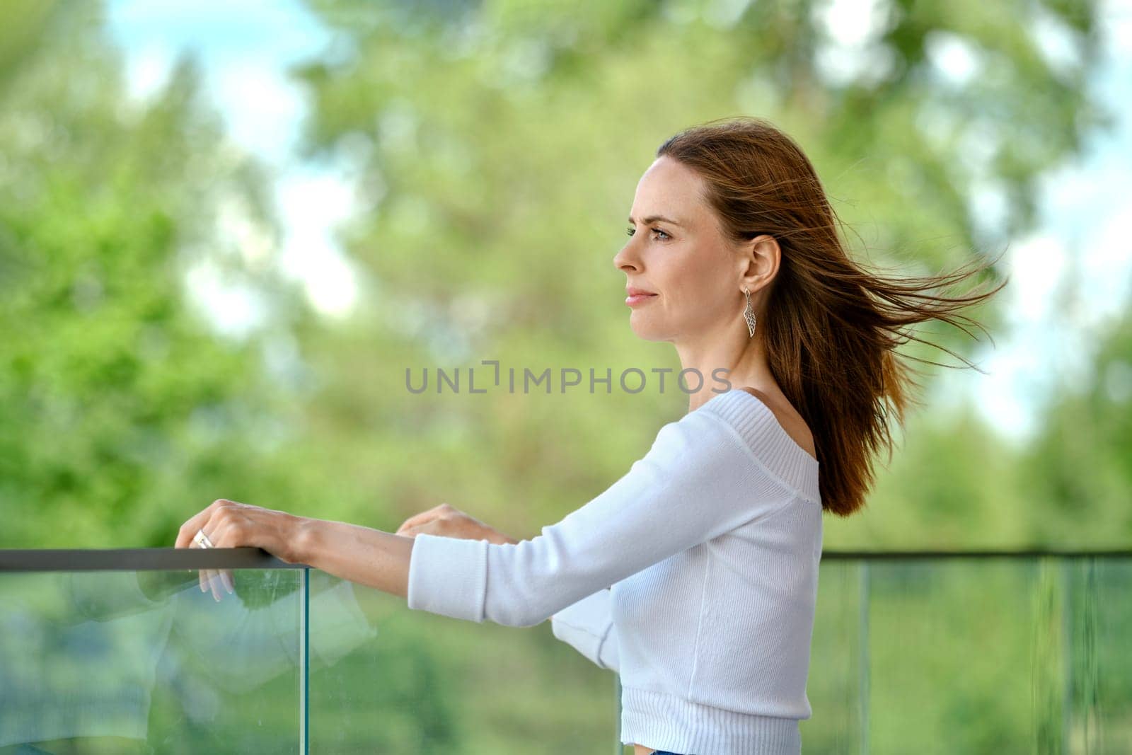 Cute woman looking at the cityscape