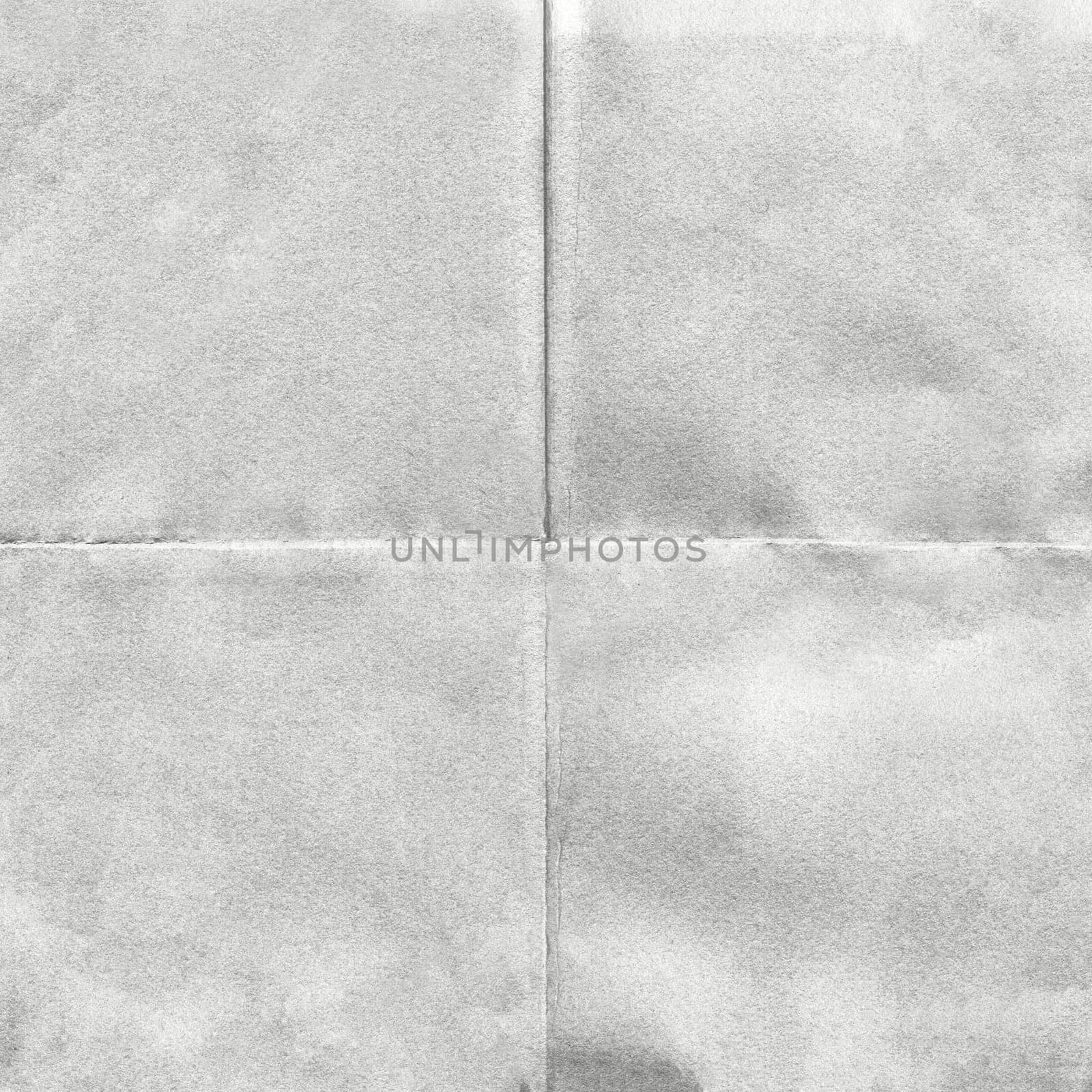 Background image made of gray-white paper with folds in the form of a crosshair