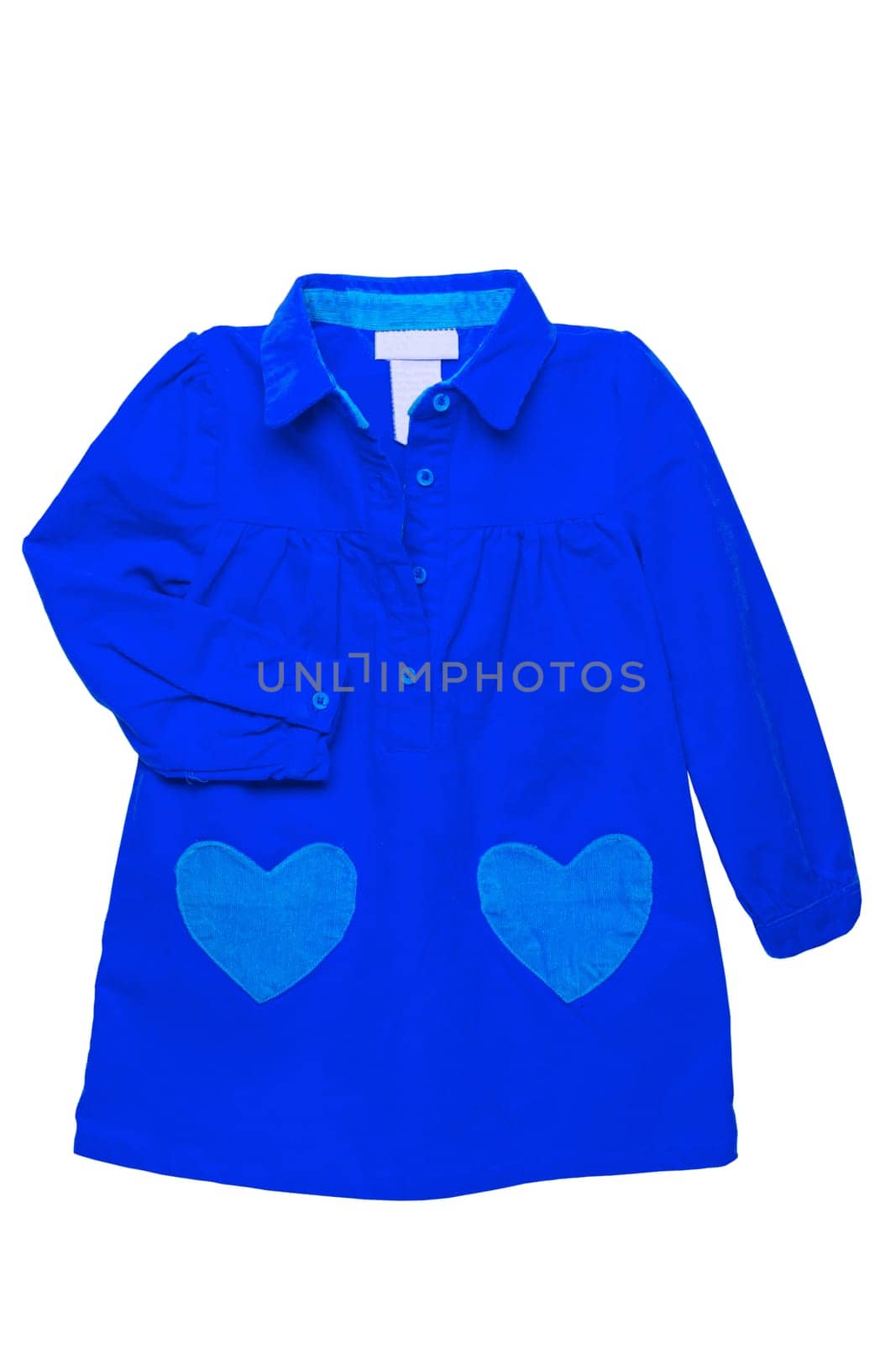 Summer dress isolated. A beautiful blue girls dress with attached heart shaped pockets and long sleeves isolated. Clipping path. Kids spring and autumn fashion.