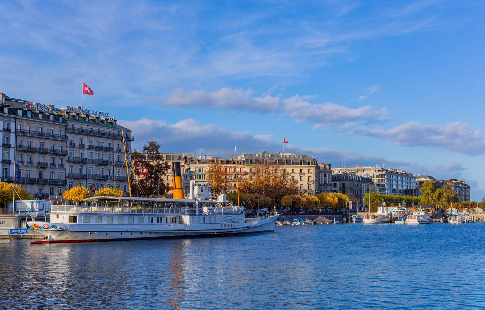 Geneva, Switzerland: November,15 2023: Boats on Lake Geneva. Lake Geneva iis a lake on the north side of the Alps, shared between Switzerland and France.