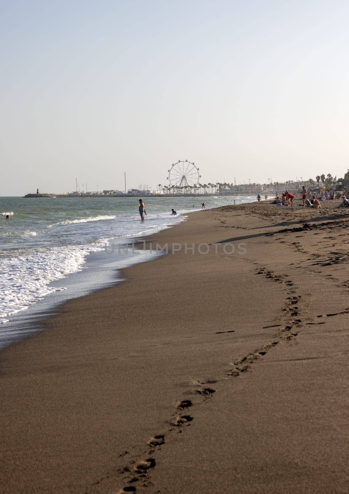 Torremolinos, Spain - September 15, 2023:  La Carihuela beach in Torremolinos, Malaga, Costa del Sol, Spain