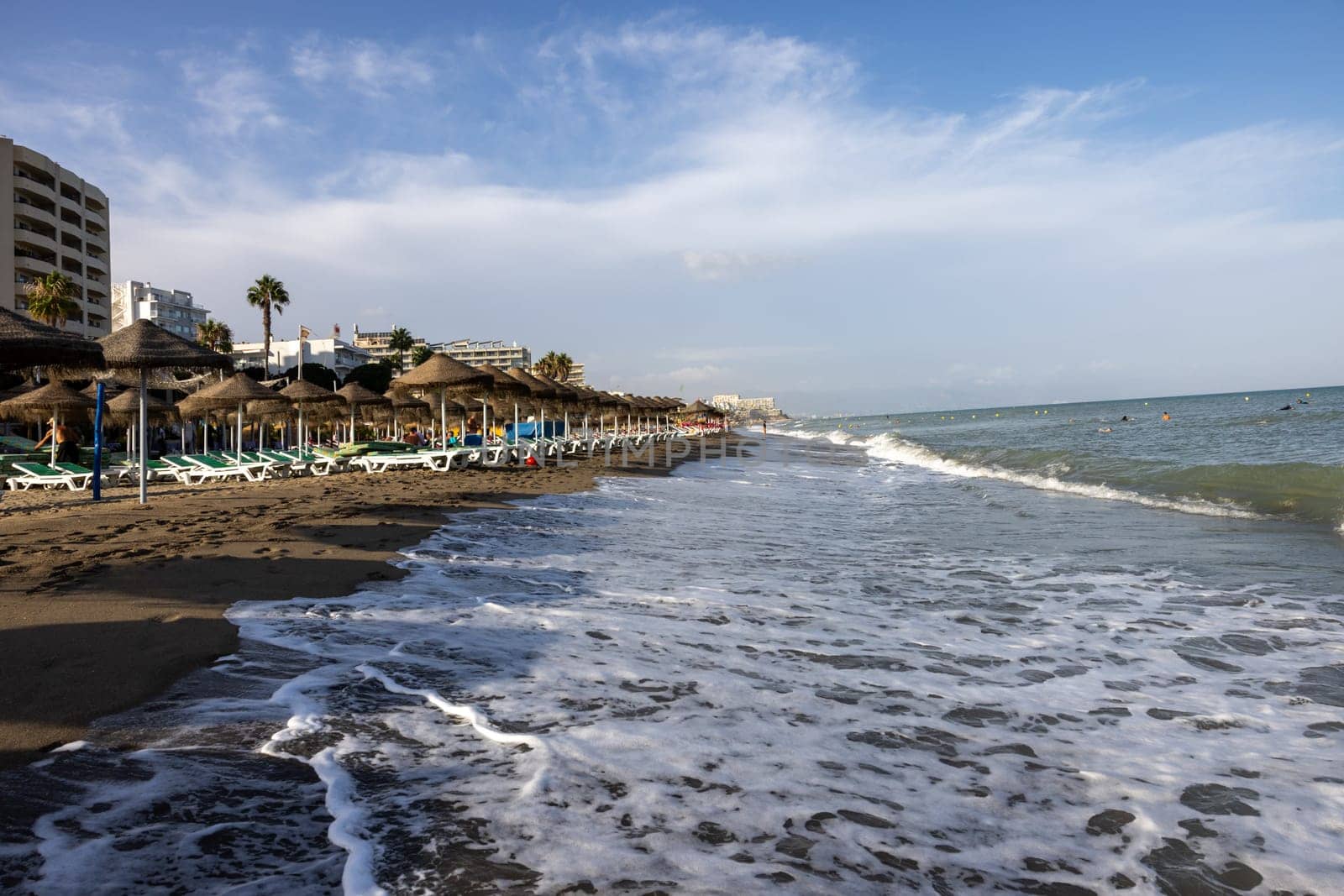 Torremolinos, Spain - September 15, 2023: La Carihuela beach in Torremolinos, Malaga, Costa del Sol, Spain