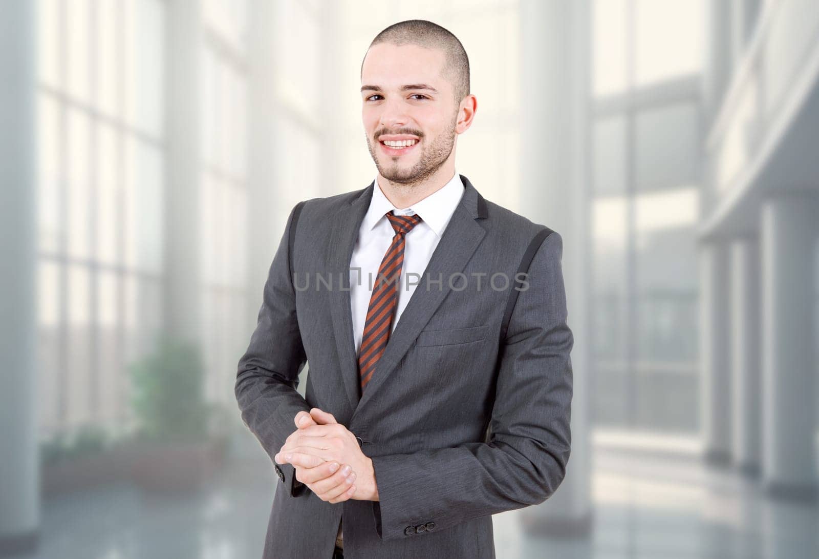 young business man portrait at the office