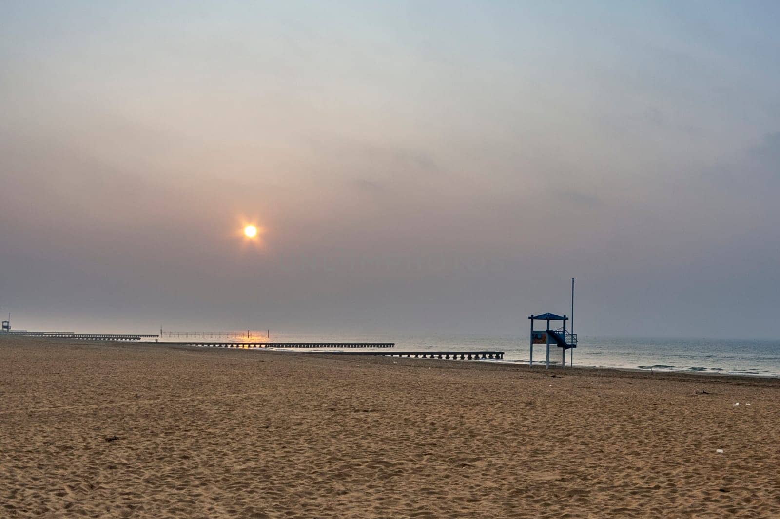 famous Lido beach of Venice in morning light without people