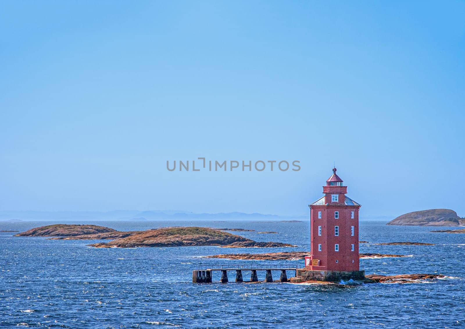 The Kjeungskjaer Lighthouse - Norwegian - Kjeungskjaer fyr - is a coastal lighthouse in the municipality of Oerland in Trondelag county, Norway