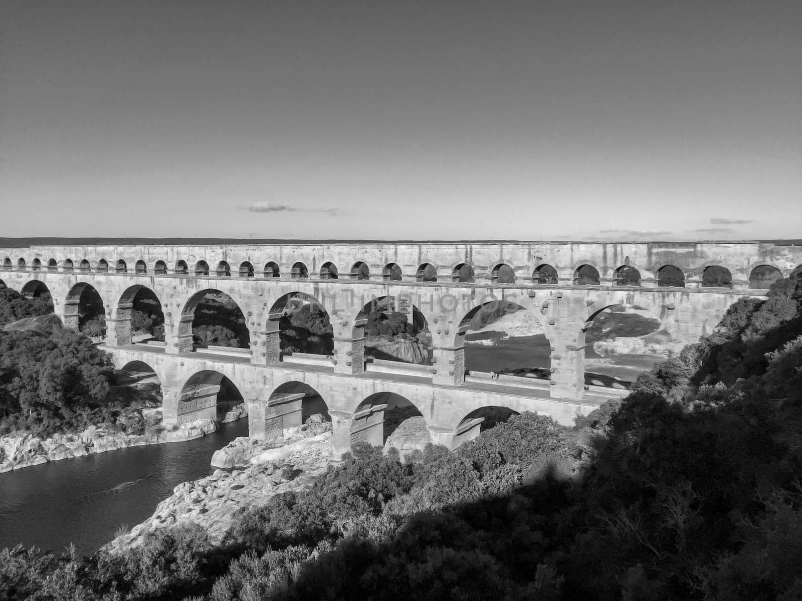 old roman aqueduct pont du gart in afternoon light