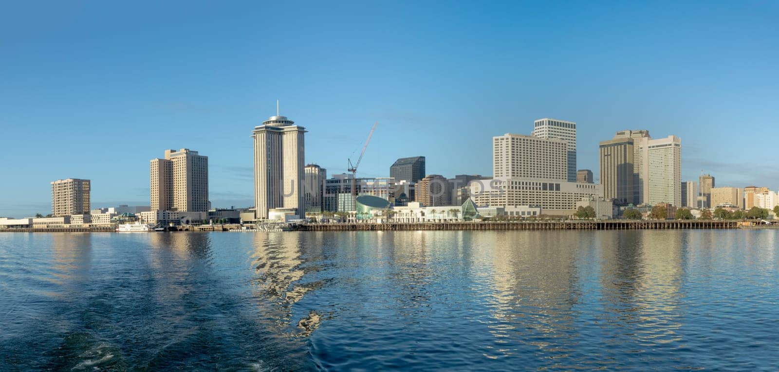 scenic view to New Orleans skyline in morning light from river Mississippi, Louisiana, USA
