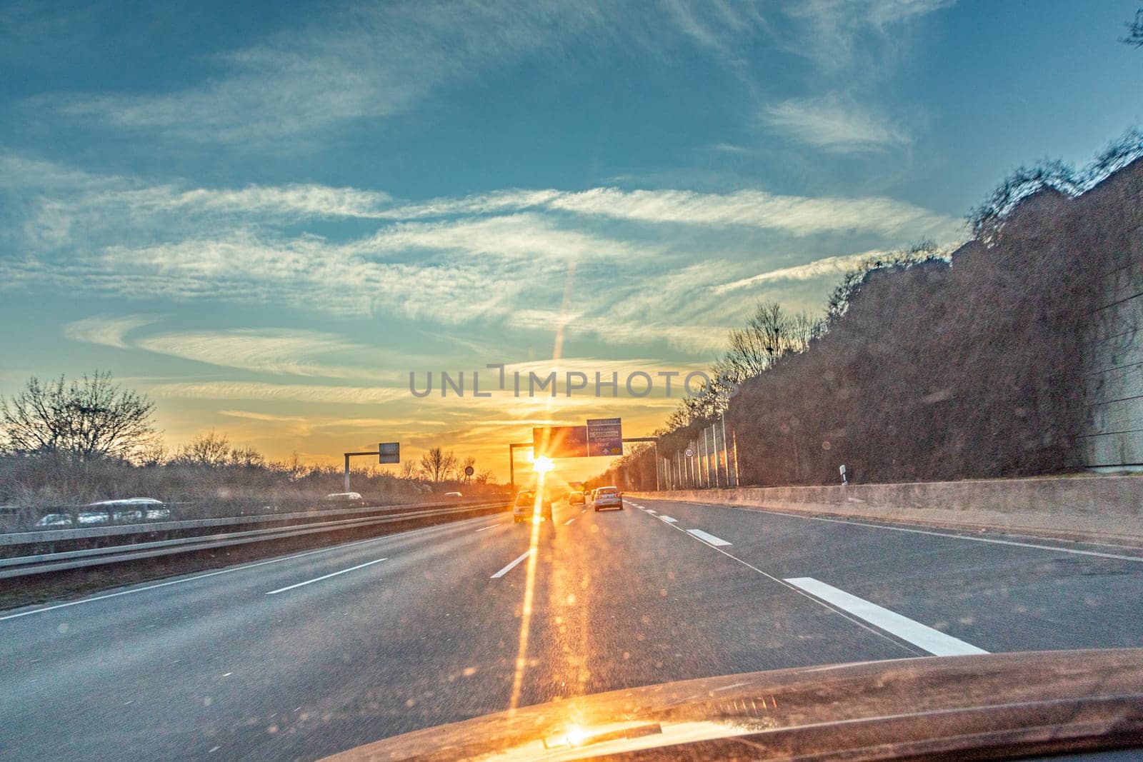 sunset at the highway with cars in Germany